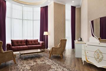 Фото номера Люкс VIP с кроватью размера «king-size» Отель Ramada by Wyndham Shymkent г. Шымкент 8