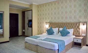 Фото номера Люкс с 1 спальней Отель Dostar Inn г. Шымкент 3