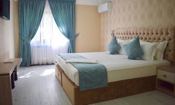 Фото номера Люкс с 1 спальней Отель Dostar Inn г. Шымкент 5