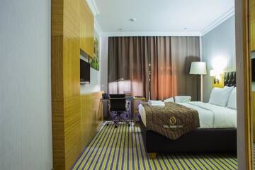 Фото номера Стандартный двухместный номер с 1 кроватью Отель Aidana Plaza Hotel г. Шымкент 4