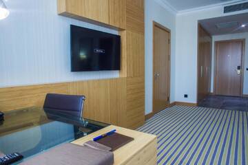 Фото номера Двухместный номер Делюкс с 1 кроватью Отель Aidana Plaza Hotel г. Шымкент 4