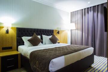 Фото номера Стандартный двухместный номер с 1 кроватью Отель Aidana Plaza Hotel г. Шымкент 9