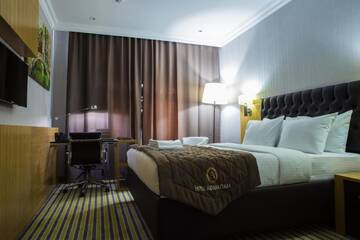Фото номера Стандартный двухместный номер с 1 кроватью Отель Aidana Plaza Hotel г. Шымкент 8