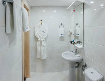 Фото номера Стандартный двухместный номер с 2 отдельными кроватями Отель Express city hotel г. Шымкент 3